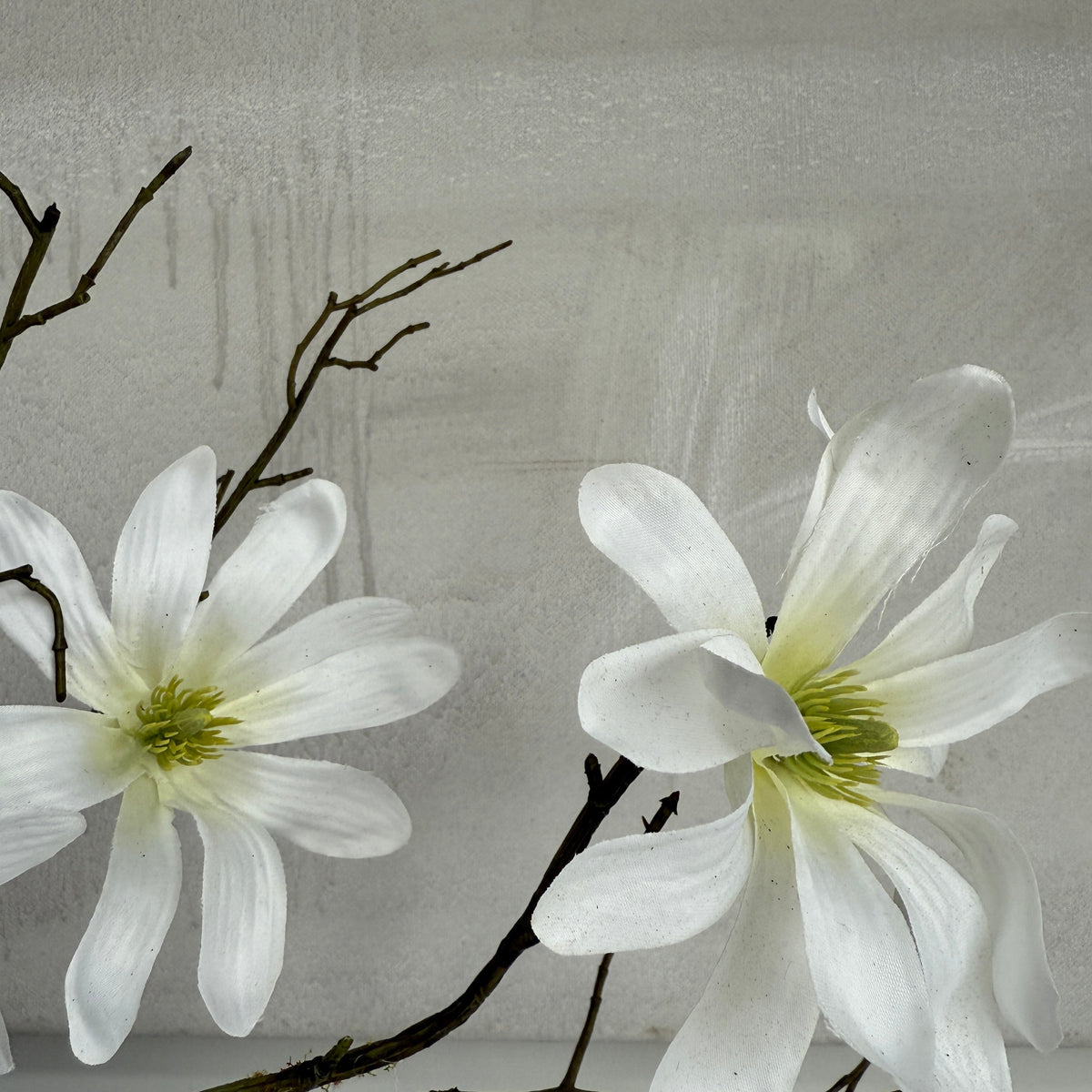 Faux white magnolia spray 71cm